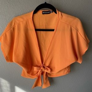 Orange cropped shirt